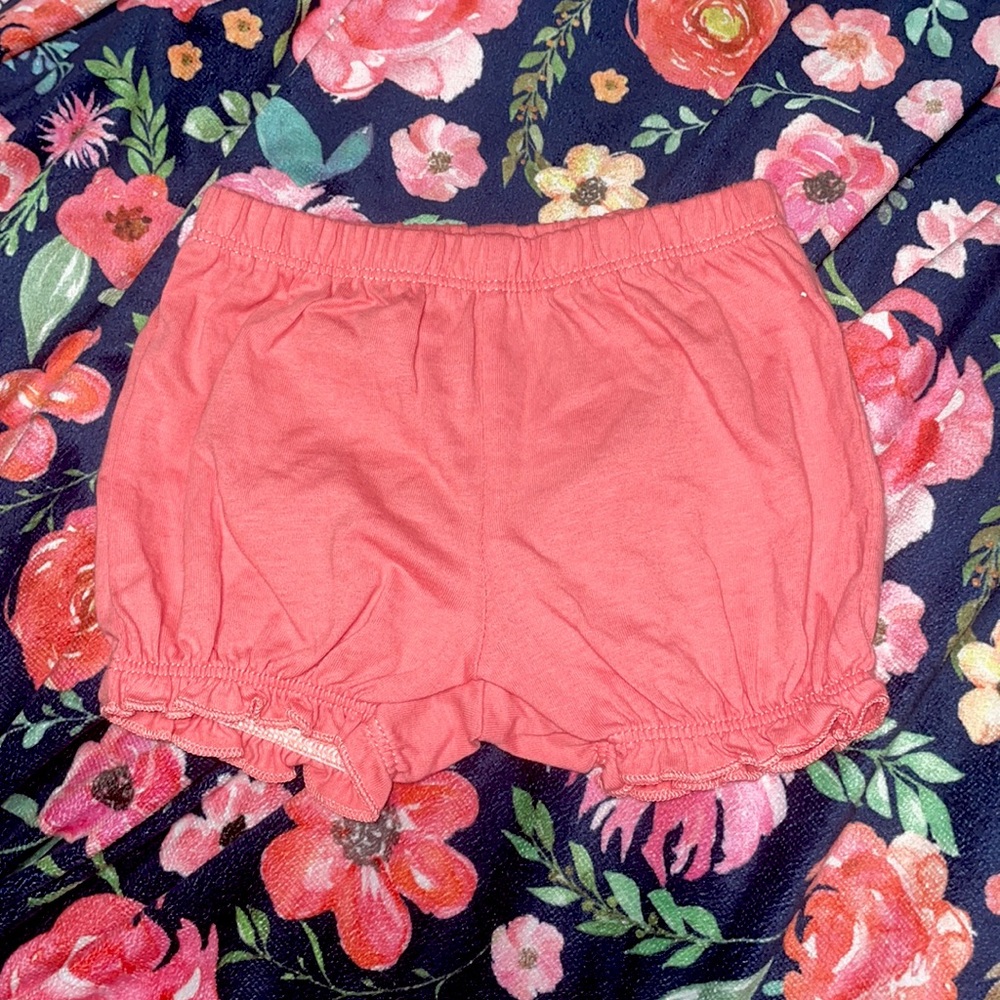 Carter’s peach colored shorts